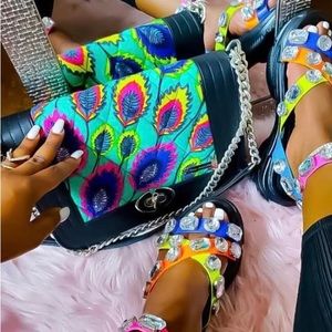 Never used Tribal Addiction handbag with long strap.